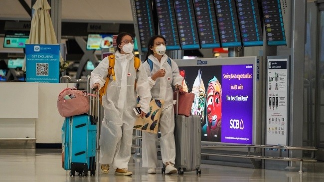 Passengers walk through Suvarnabhumi Airport in Bangkok on June 8. (Photo: Nikkei Asian Review)