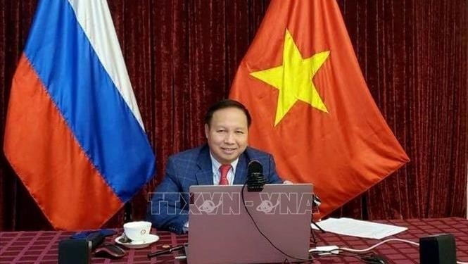 Vietnamese Ambassador to Russia Ngo Duc Manh participates in the virtual workshop. (Photo: VNA)