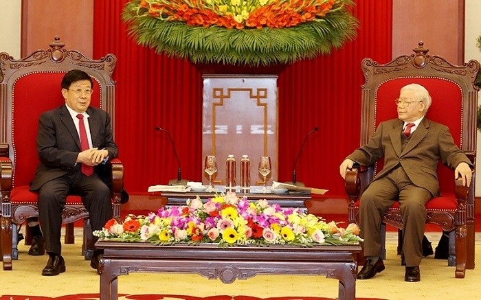 Party General Secretary and State President Nguyen Phu Trong (R) receives Chinese State Councillor and Minister of Public Security Zhao Kezhi.
