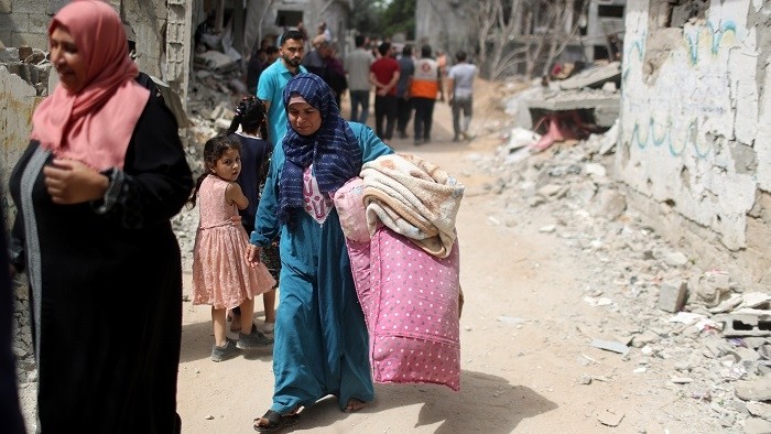 Palestinians return to their destroyed houses following the Israel- Hamas truce, in Beit Hanoun in the northern Gaza Strip, May 21, 2021. (Photo: Reuters)